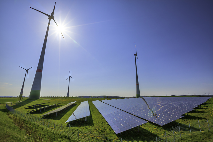 renewable energy: wind turbines and modern solar panels (HDRi)